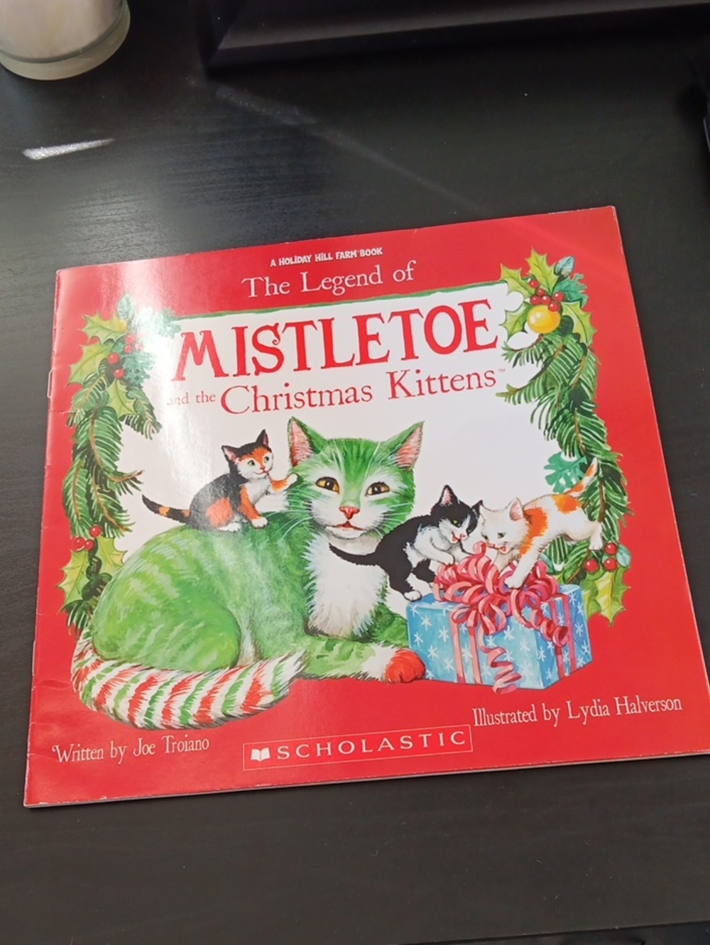 Scholastic Holiday Cover with Green Cat and Festive Kittens